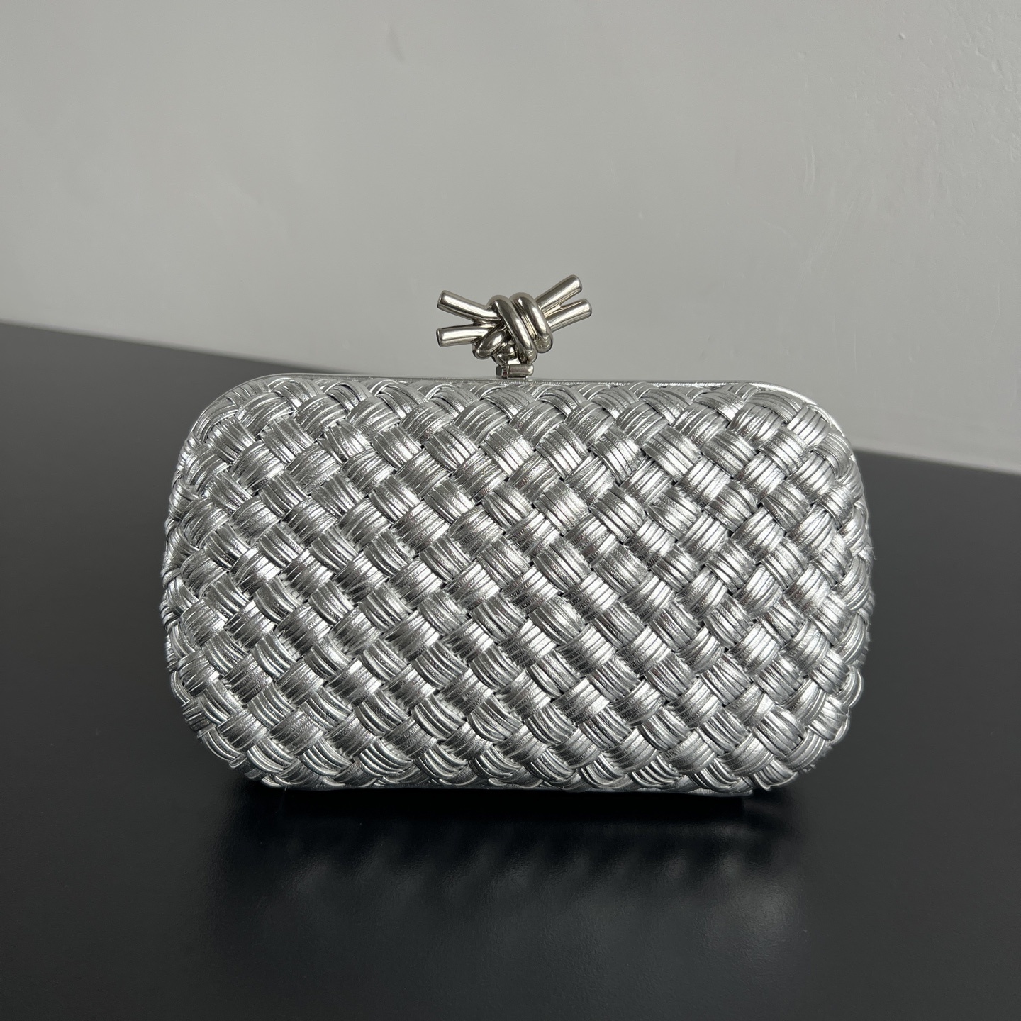 7a78a6b5 Bottega Veneta Knot Intrecciato Metallic Leather Clutch - Image 1