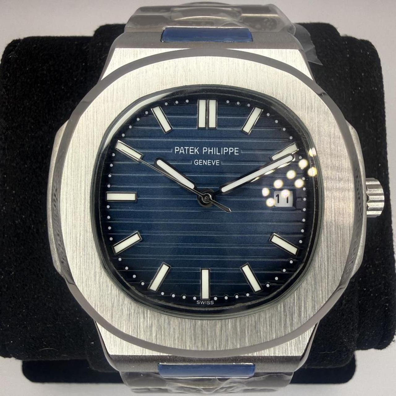 P0-26 Patek Philippe Men’s Silver and Blue Watch - Image 1