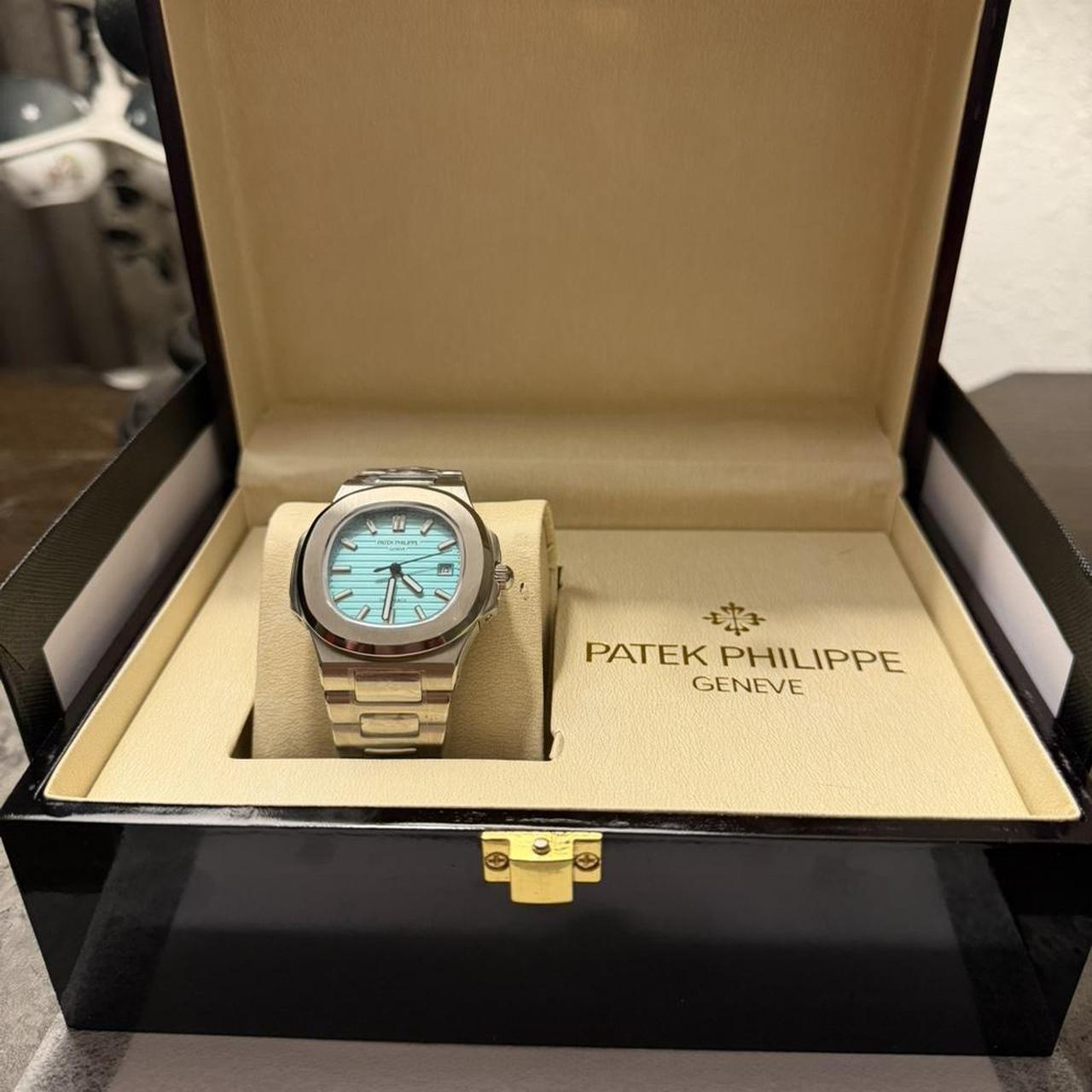 P0-35 Patek Philippe Men’s Silver and Grey Watch - Image 1